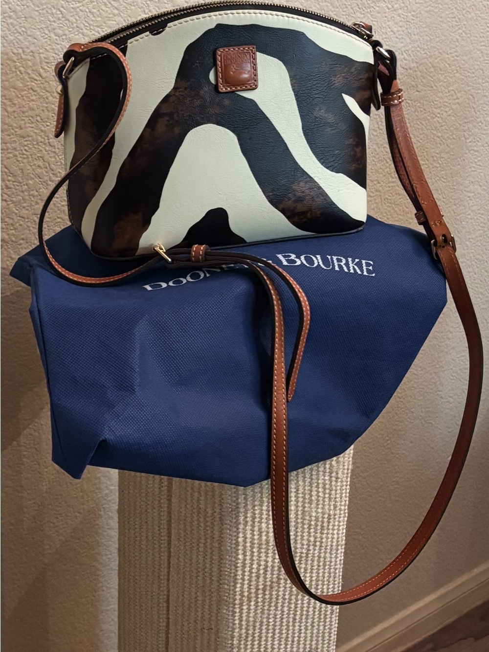 Dooney & Bourke Suki Zebra Striped leather Crossbody in black, brown and cream